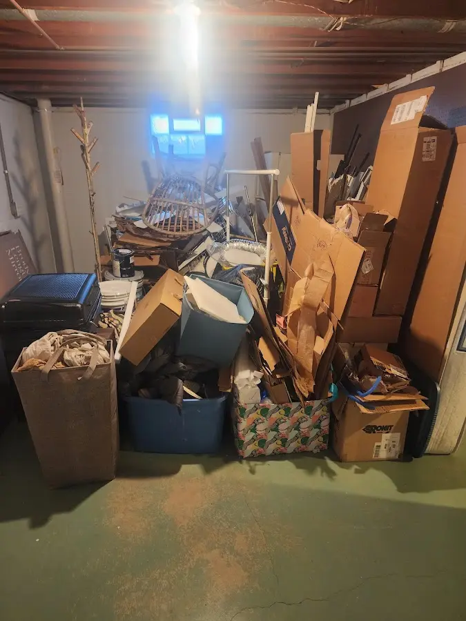 Roll-off dumpster container at job site for 2 Yard Dumpster Rental in Culpeper